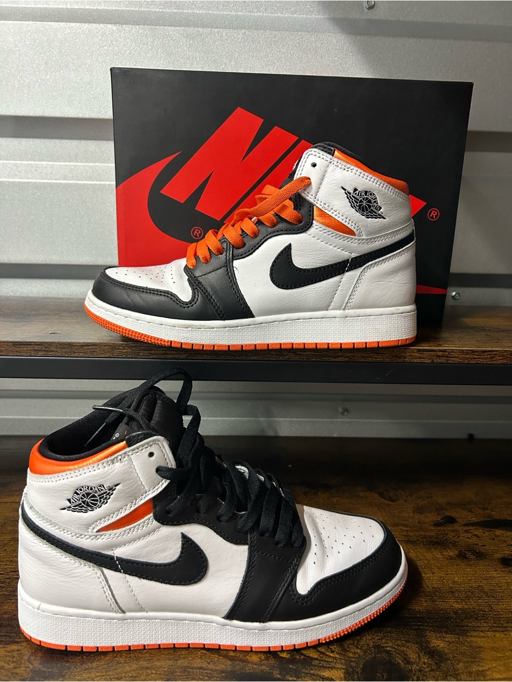 Size 6.5y - Jordan 1 Retro High Electro Orange / Reverse Shattered Back Board